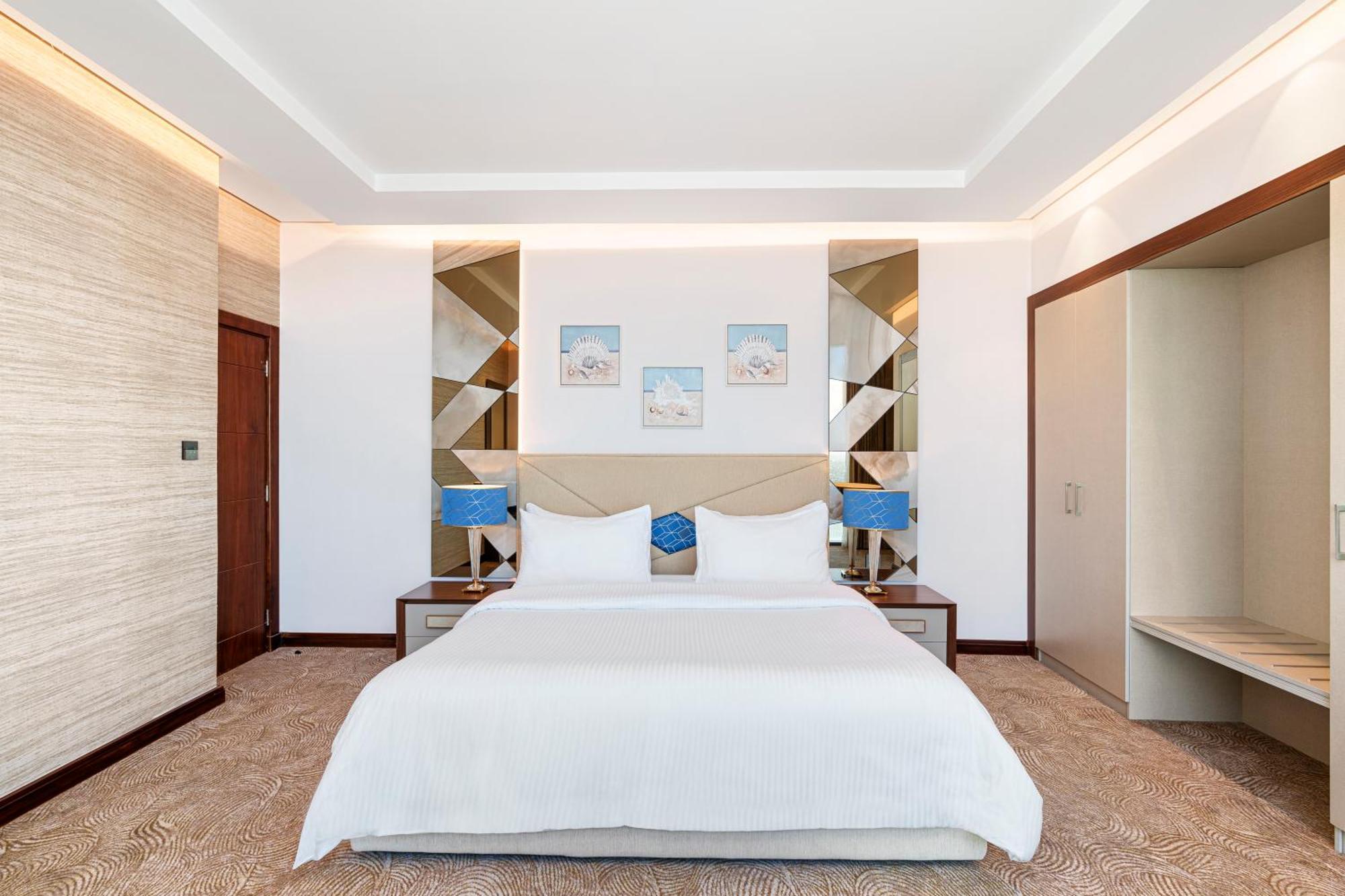 Rixos Premium Alamein El Alamein Cameră foto A bedroom at the hotel