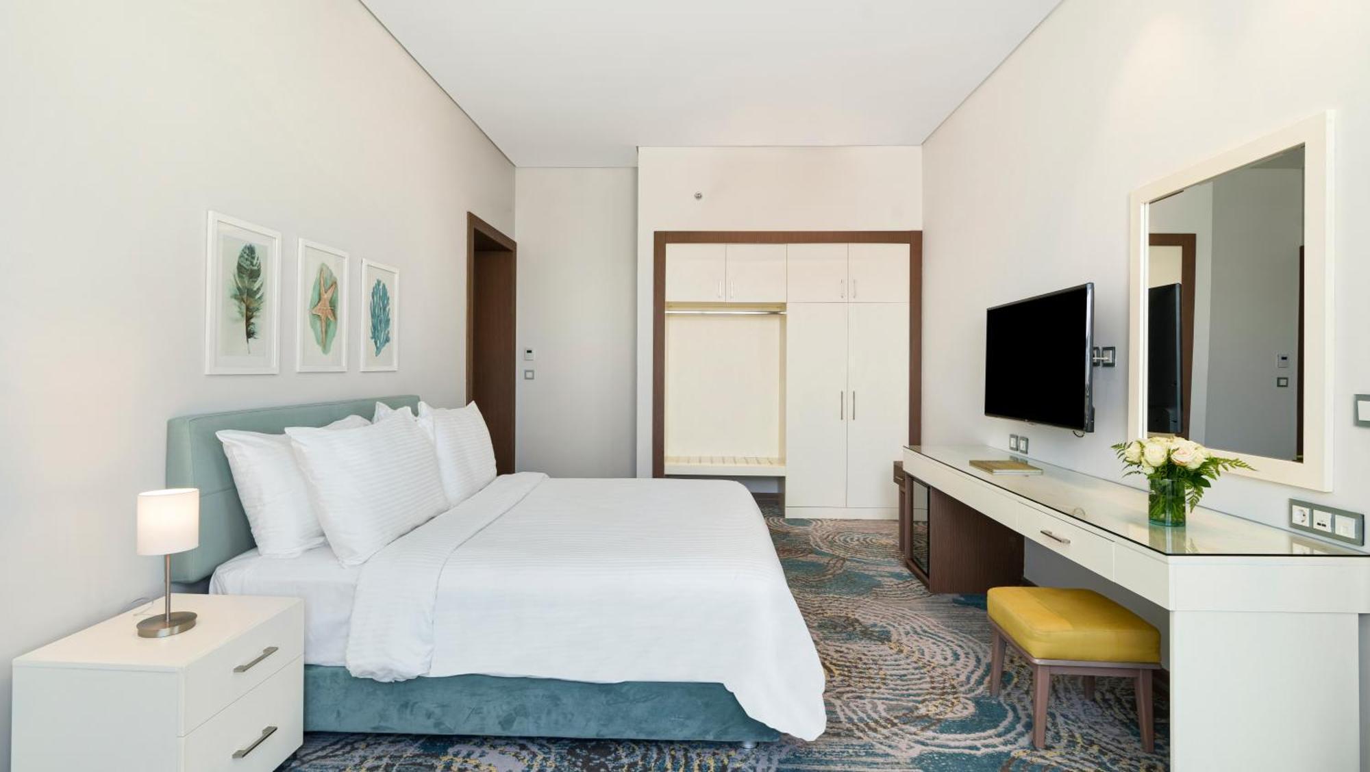 Rixos Premium Alamein El Alamein Cameră foto A bedroom at the hotel